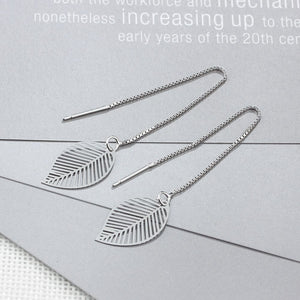 Earrings with tree leaf shape