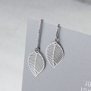 Earrings with tree leaf shape